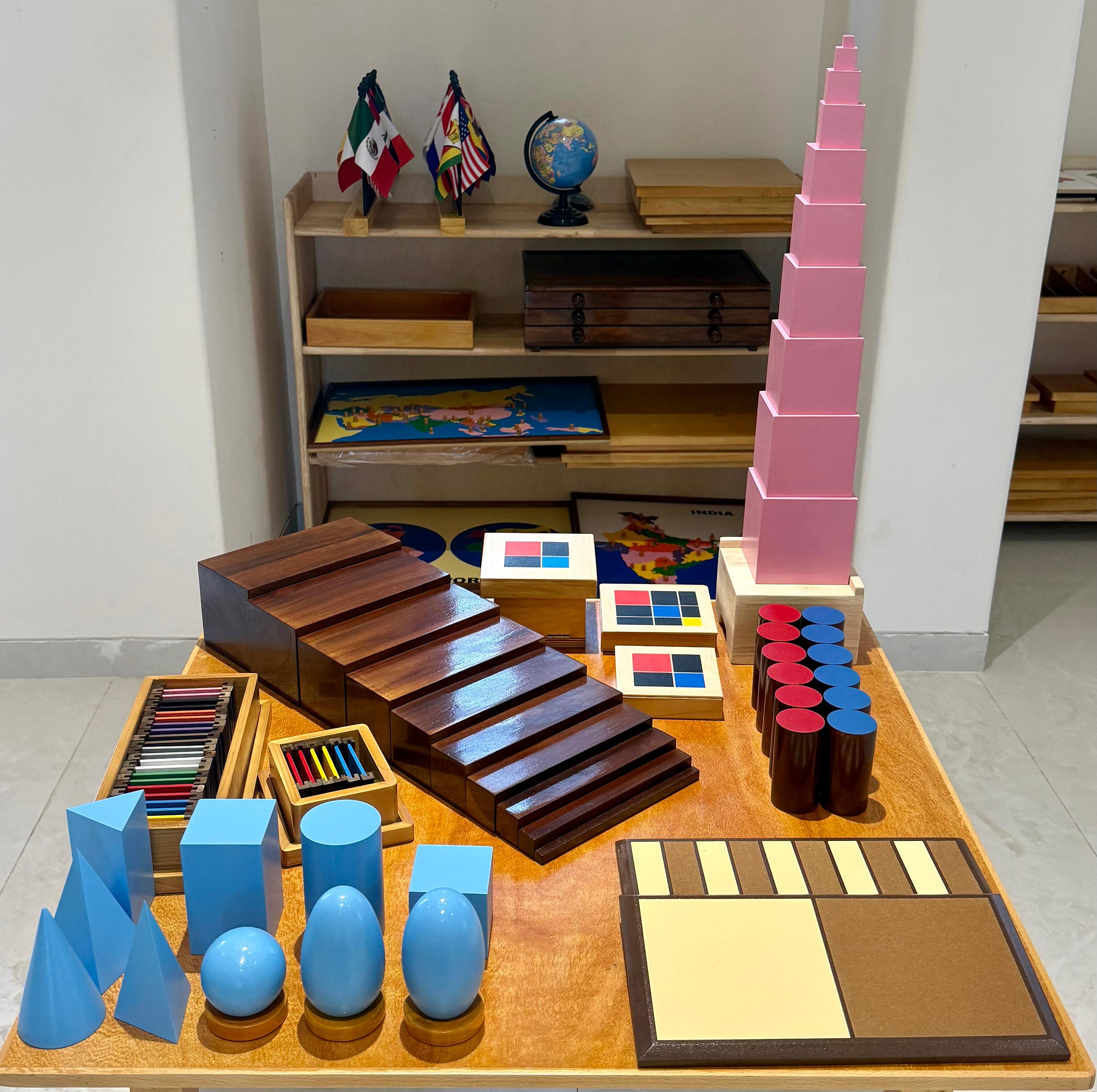 Another child with sensorial materials at TinyTrails Montessori